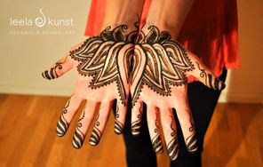 lotus flower henna on hands